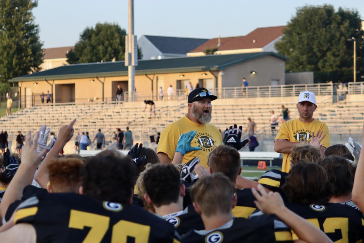 After watching his athletes perform in a game-like setting during their scrimmage on Aug. 18, head coach Justin Haberman gives the team a pep talk.