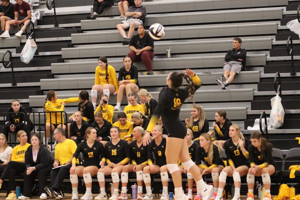 Making+a+leap%2C+Ava+Waters+%289%29+serves+the+ball+into+Omaha+Northwesterns+defense.+Waters+had+a+total+of+four+aces+throughout+the+match.