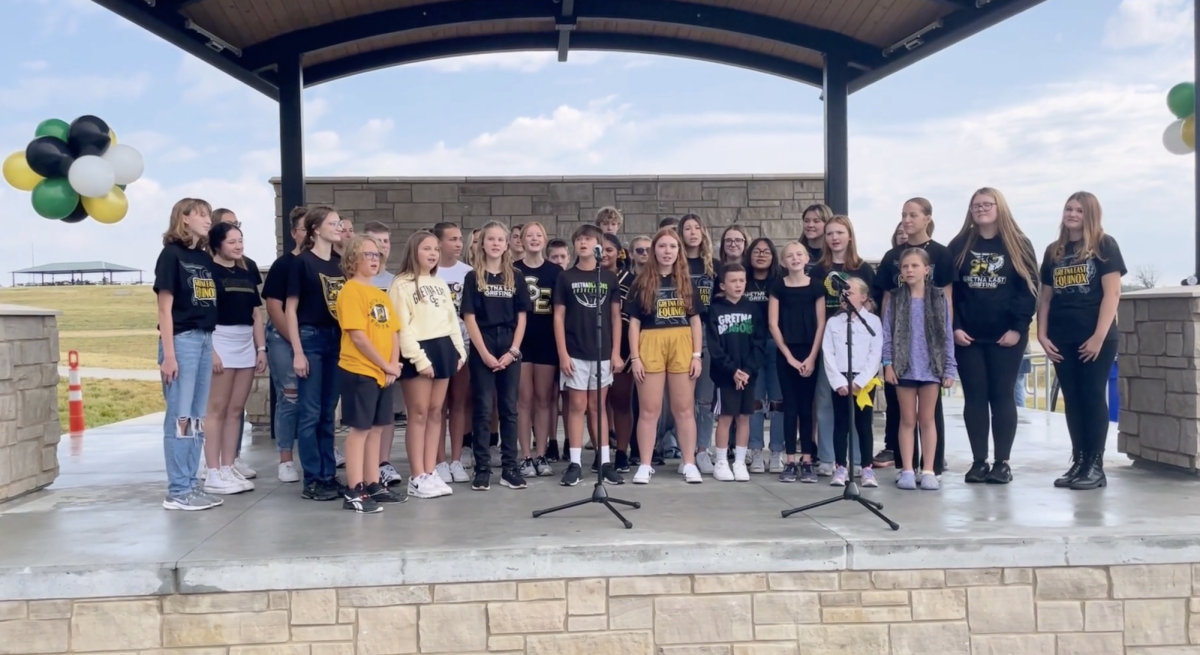 Cast members of the schools first production, Matilda the musical perform at the opening ceremonies of the Gretna Crossing YMCA on Sept. 16.