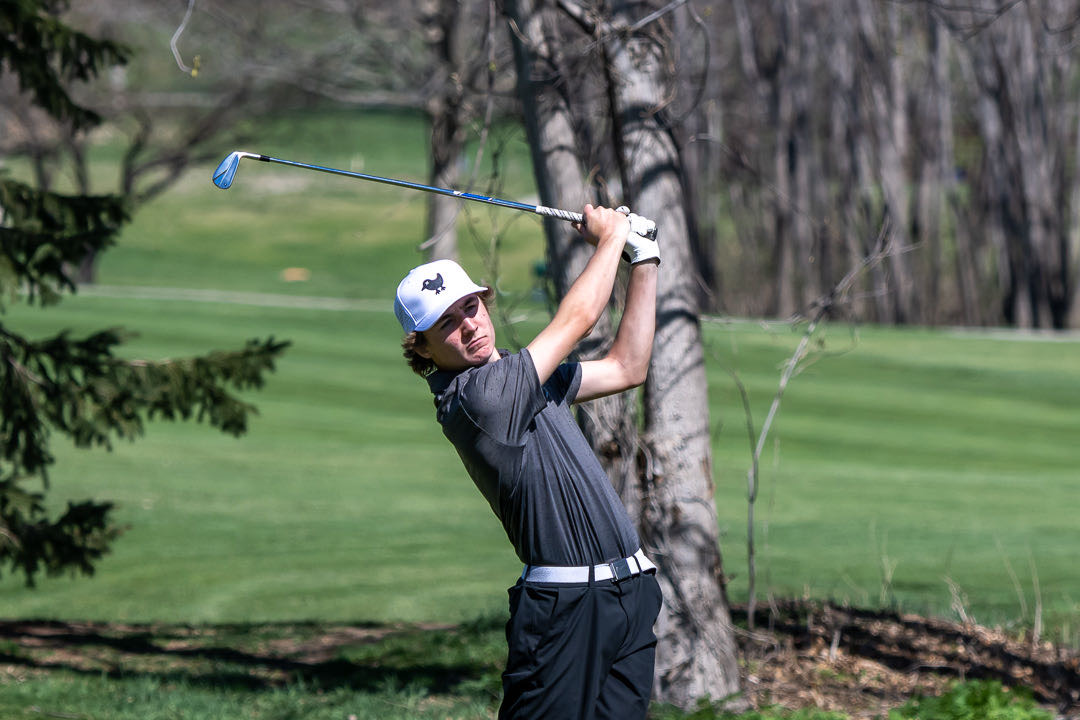 As part of the Gretna High School golf team, Will Barth  takes a swing at the Willow Lakes Golf Course in Bellevue during the Bellevue West Invite on April 19.