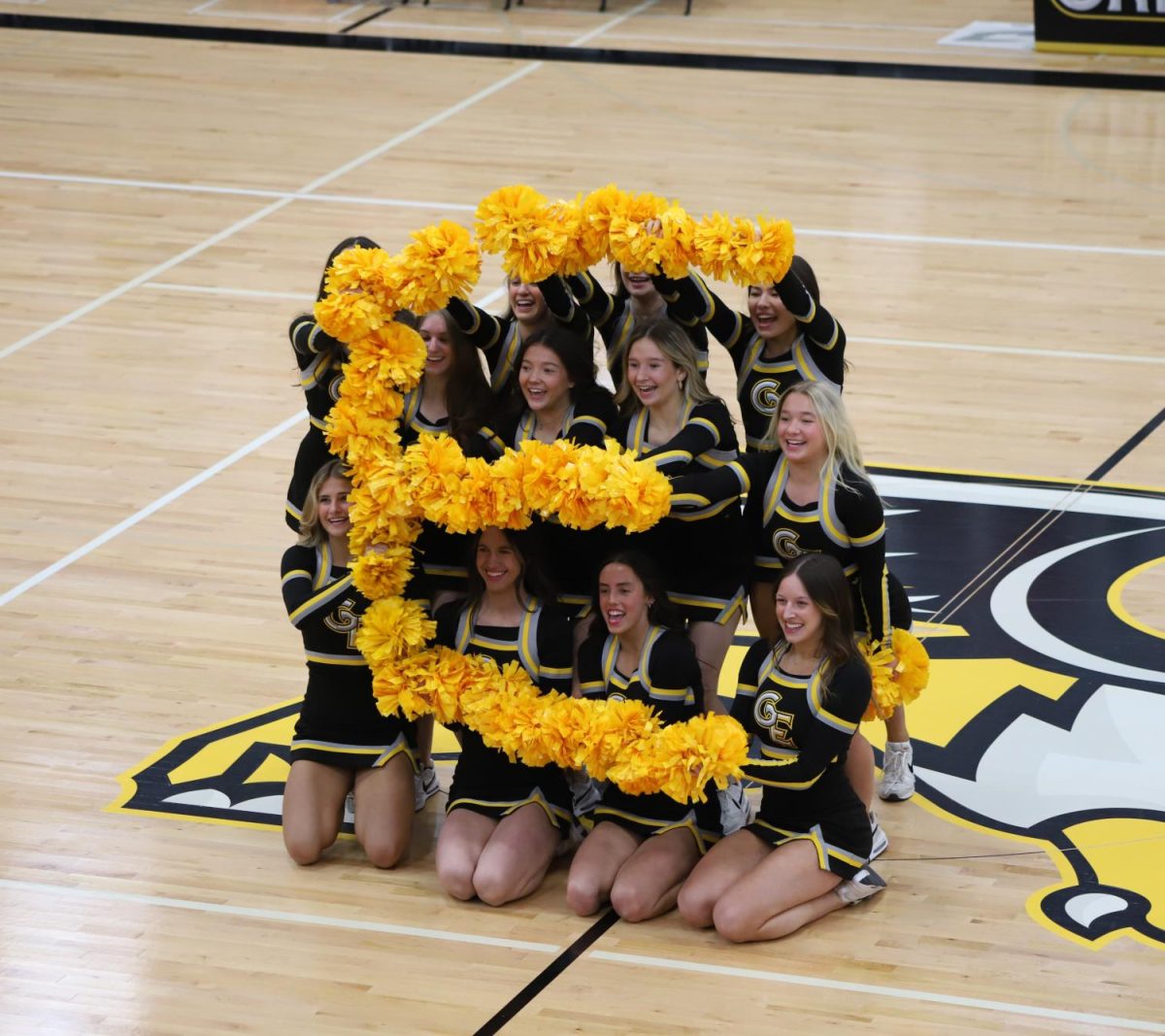 Making the E for East, the dance team performs their ritual.
