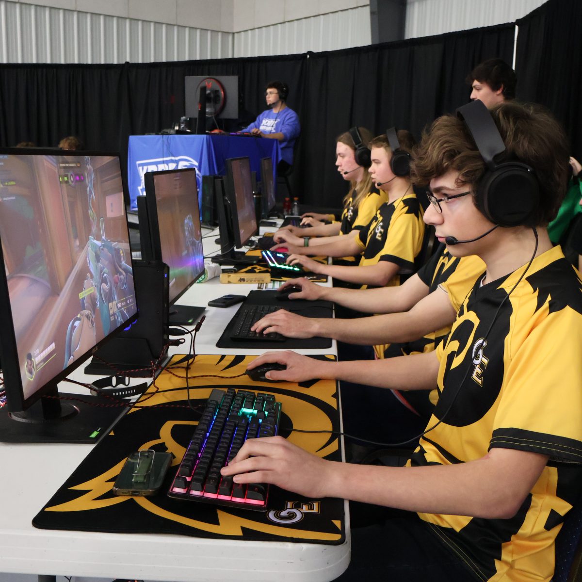 Eyes on the screen, sophomores Jackson Omel, Zachary Thompson and Weldon compete in the Overwatch 2 finals against York. The team ended up losing 0-2, earning second place.