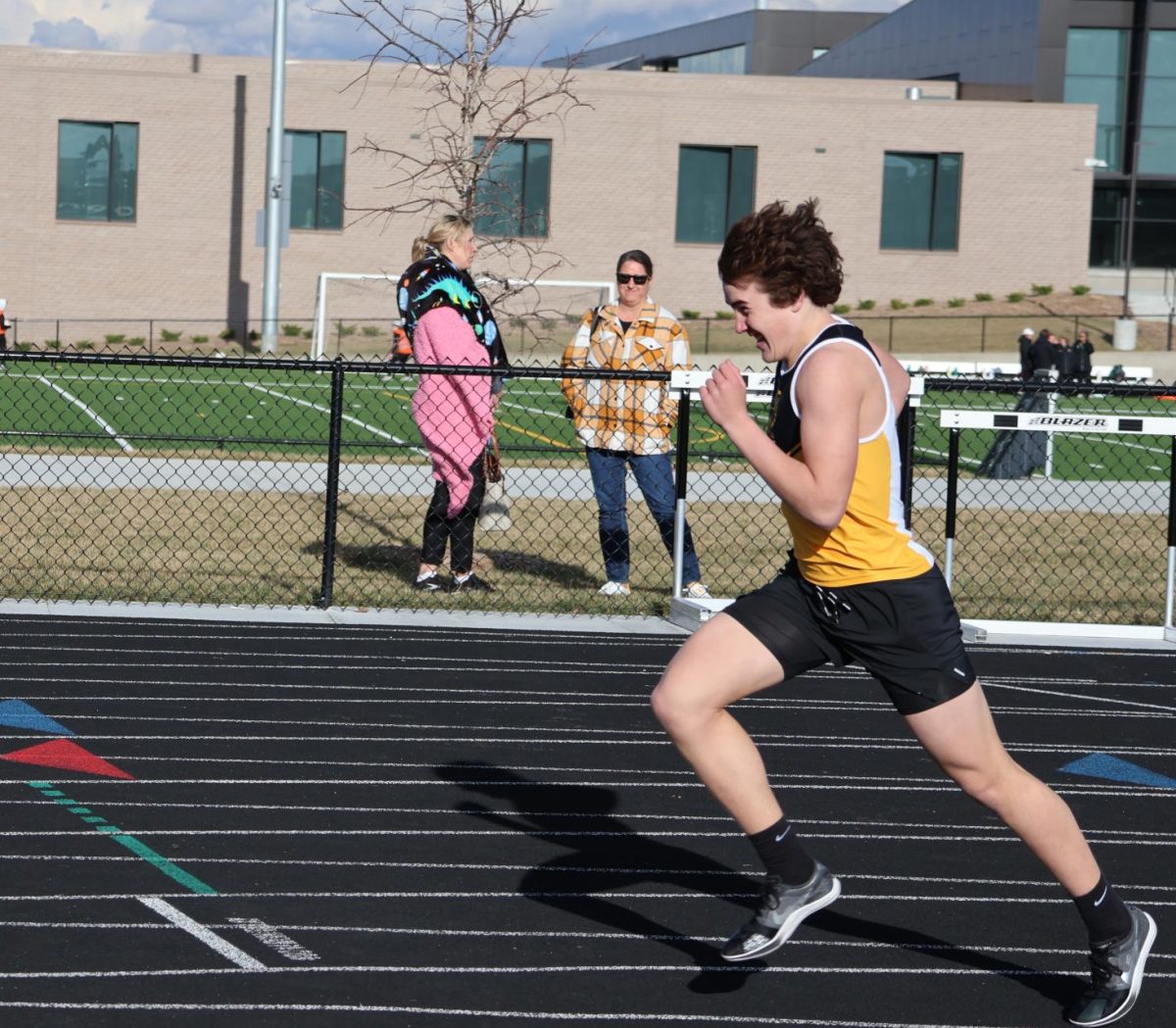 Taking off for his 800m race, freshman Brody Boone takes the lead and finishes first overall.