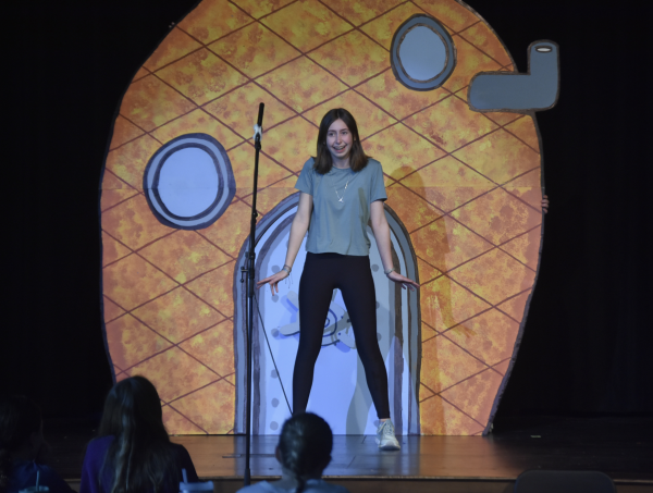 On stage, Zoey Zarling practices her role as Spongebob. Zarling is on the Sponge team as the lead. 