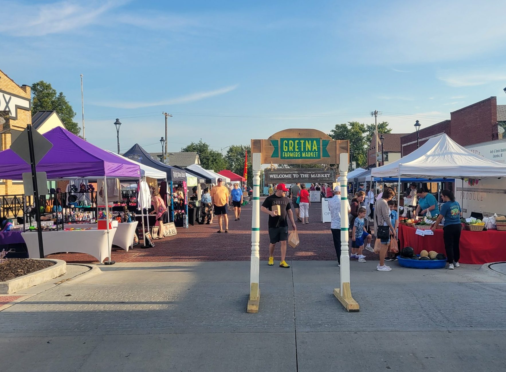 At the Gretna Farmer's Market on Aug. 24, shoppers and vendors buy and sell locally made items.