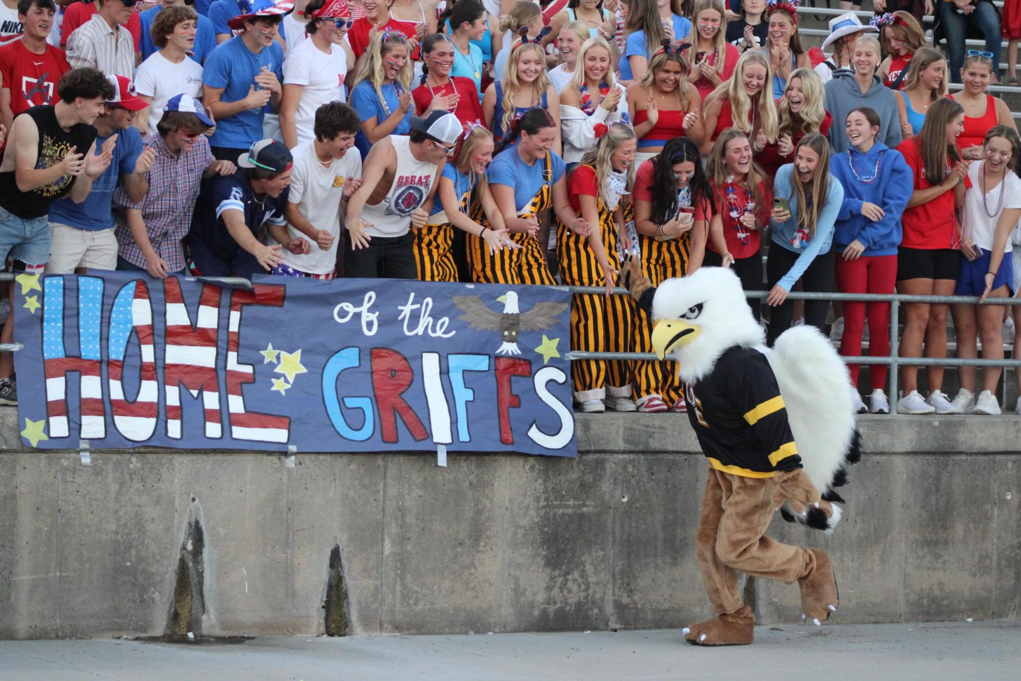 Hyping up the crowd on Sept. 27, the Griffin mascot prepares the student section for the game. 