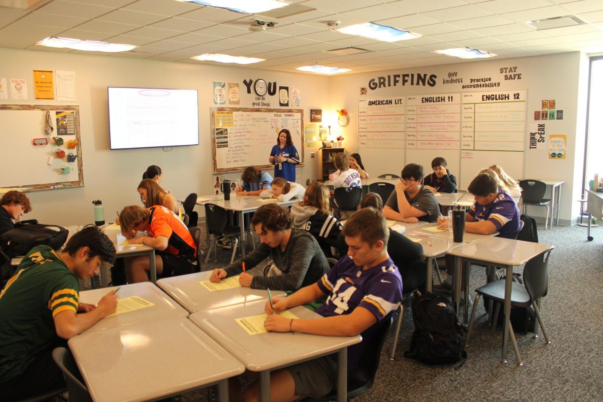 In preparation for a test, students in Mrs. Copple's 8th hour American Literature class work on a worksheet.