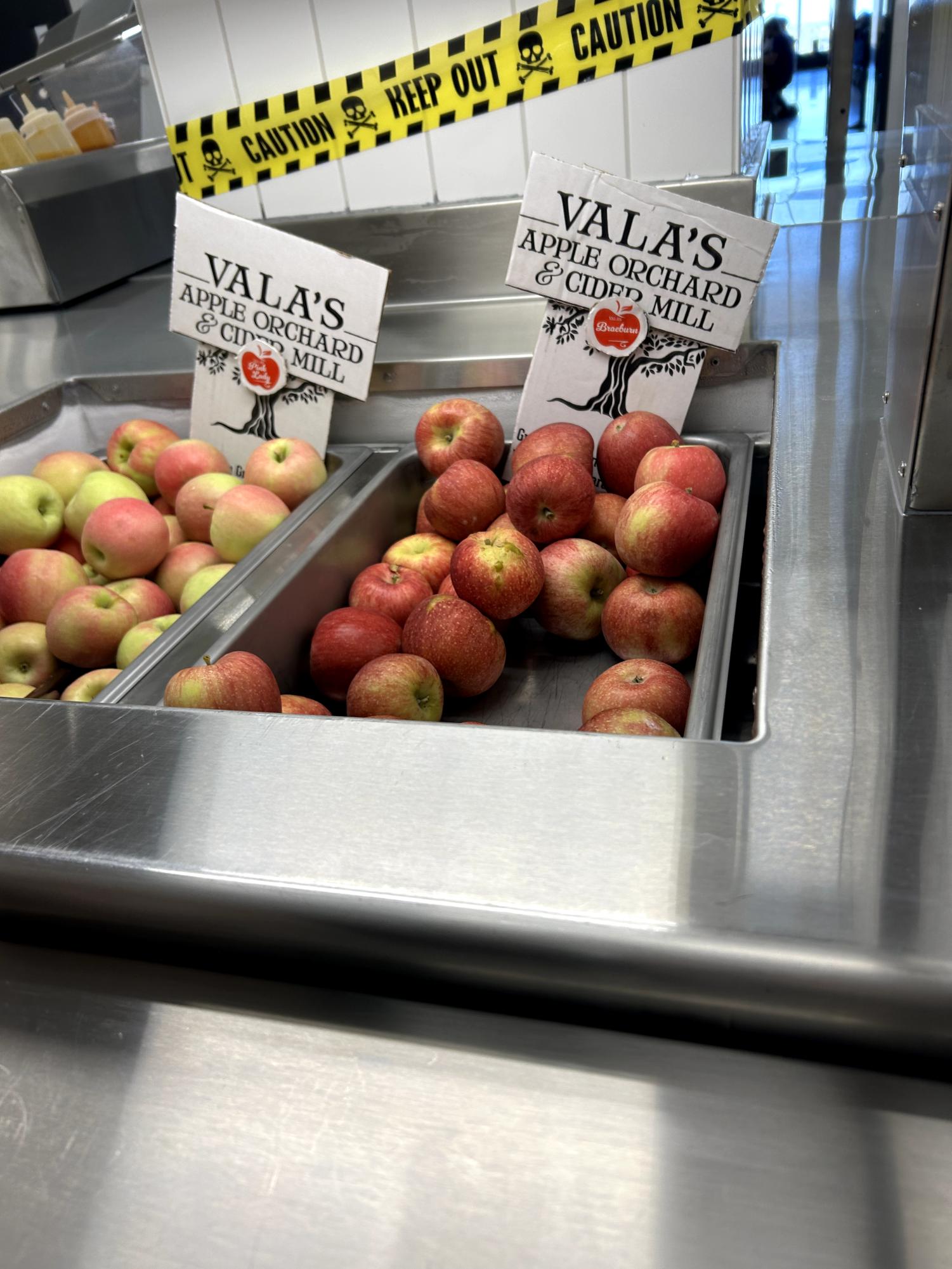 On display, Valas apples can be seen in the lunch room on Oct. 22. They are labeled with signs to show how the school locally provides much of its food.