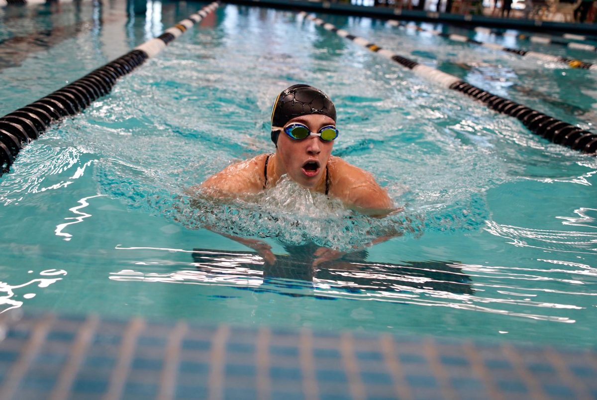 On the breaststroke lap, junior Ryleigh Brandenburgh swims the 200 Individual Medley.