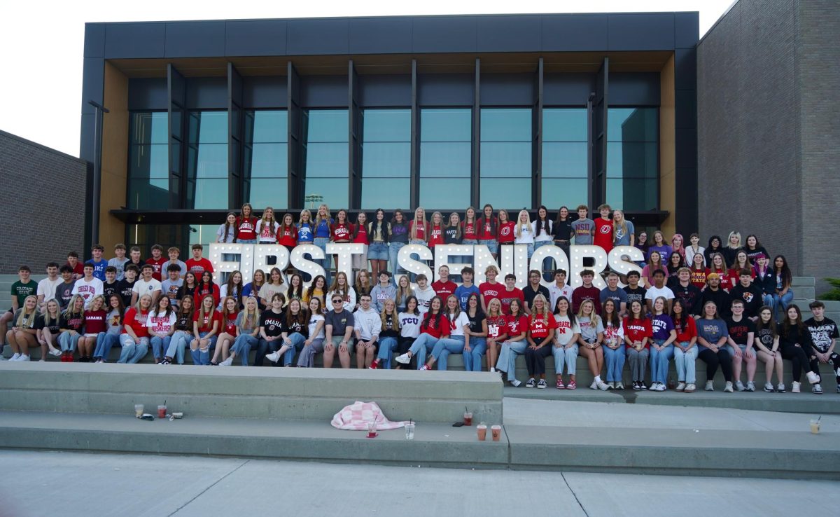 The first senior class poses for a group photo on their last day of high school. 