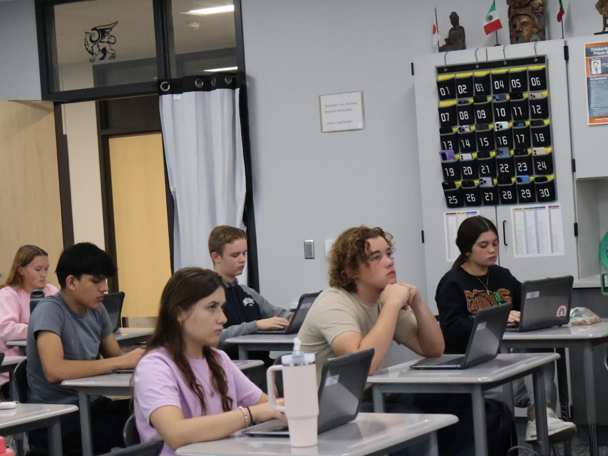 On Sept. 18, 2024, students in Mike Brandon's World History class listen to the lecture while their phones sit in the caddy. 
