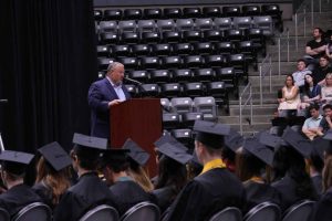 Addressing the school's first graduating class, commencement speaker David Gulizia recognizes the class of 2025 and gives them words of advice for their
futures on May 11.