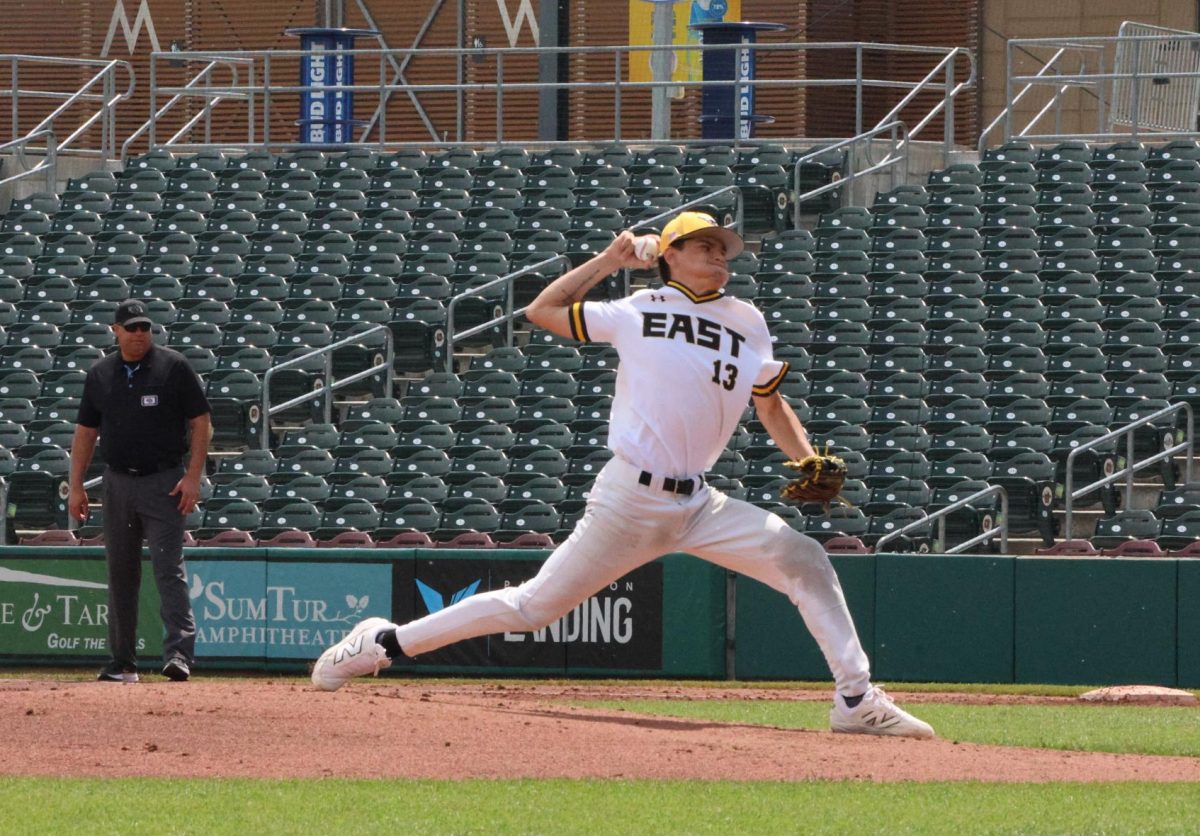 Pitching on the mound, junior Chase Neneman delivers the first strikeout of the May 16 state baseball game at Werner Park. Neneman pitched the first four innings of the game, with three strikeouts, one walk and three runs given up.